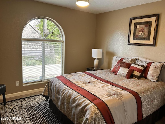 bedroom featuring hardwood / wood-style flooring