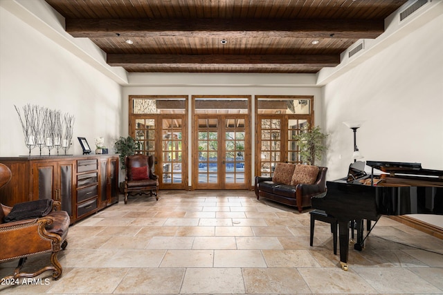 living area with stone tile floors, french doors, visible vents, and wooden ceiling