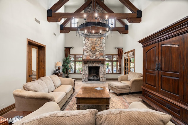 living area featuring high vaulted ceiling, beam ceiling, a fireplace, a notable chandelier, and visible vents