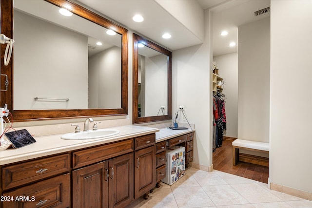 bathroom with vanity and tile patterned floors