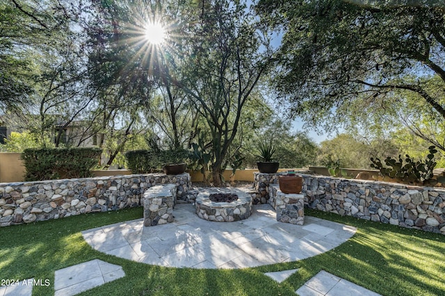 view of patio featuring an outdoor fire pit