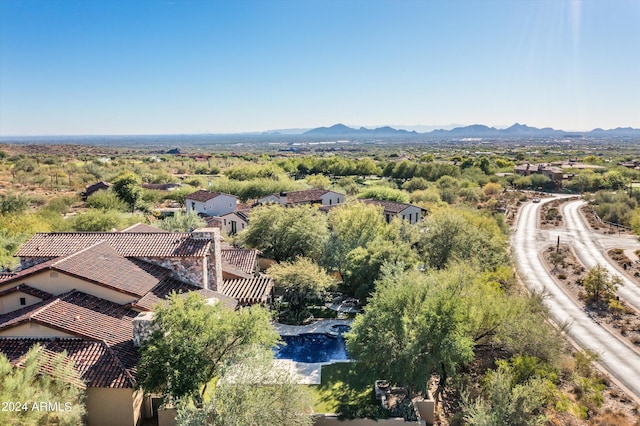 drone / aerial view featuring a mountain view