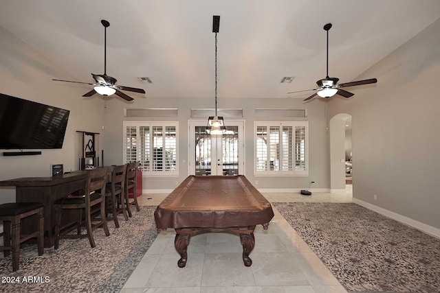 rec room with light tile patterned flooring, french doors, a healthy amount of sunlight, and billiards