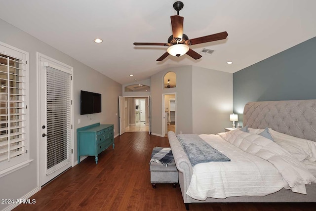 bedroom with ceiling fan, dark wood-type flooring, and lofted ceiling