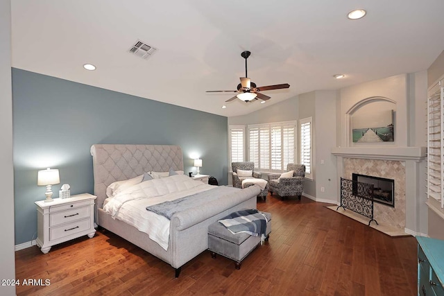 bedroom with dark hardwood / wood-style flooring, ceiling fan, and lofted ceiling