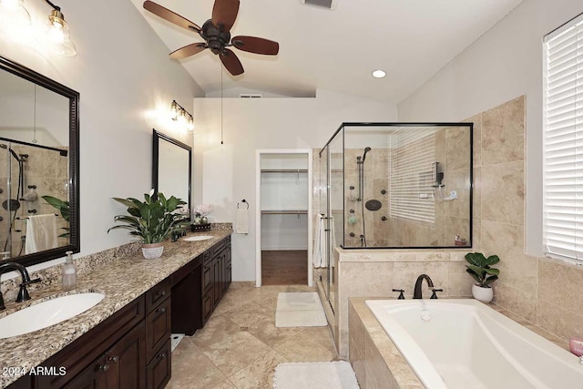 bathroom featuring vanity, vaulted ceiling, tile patterned flooring, ceiling fan, and independent shower and bath