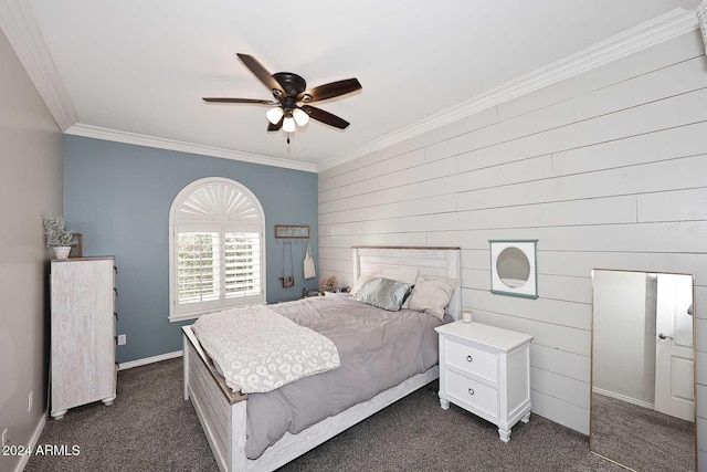 carpeted bedroom with ceiling fan and ornamental molding