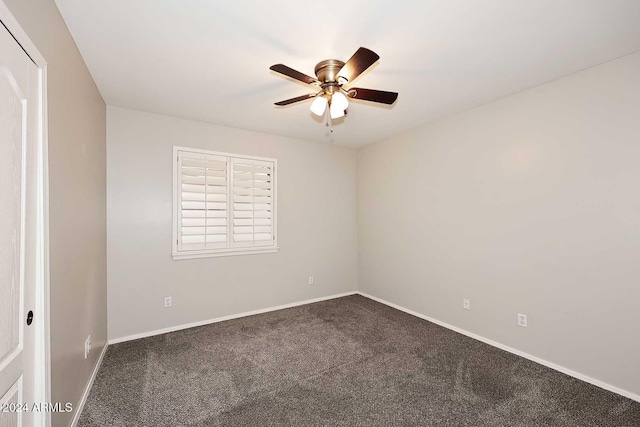 unfurnished room with carpet flooring and ceiling fan