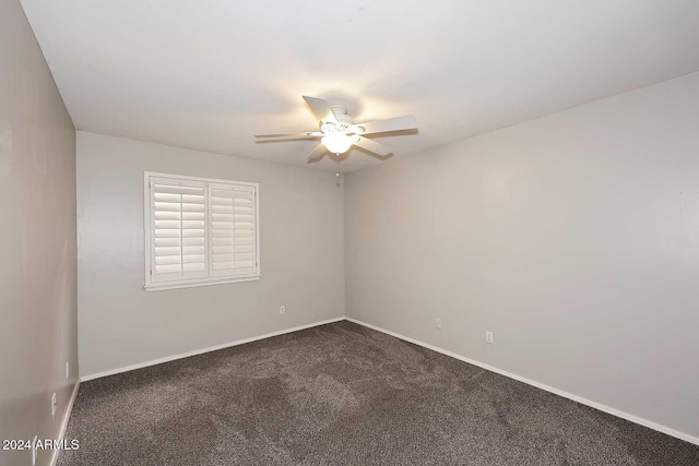 unfurnished room with carpet flooring and ceiling fan