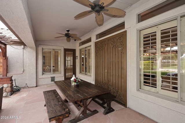 view of patio / terrace featuring ceiling fan