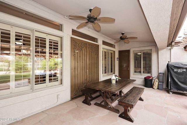 view of patio / terrace with a grill and ceiling fan