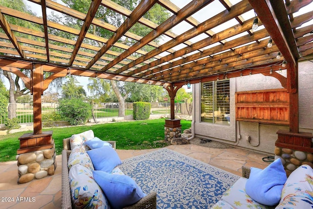 view of patio with outdoor lounge area and a pergola