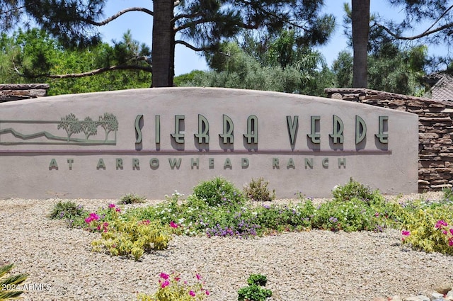 view of community sign