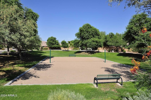 view of community featuring a yard and volleyball court