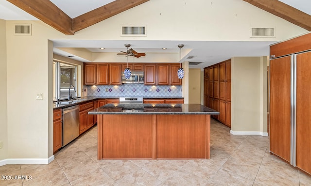 kitchen with visible vents, stainless steel appliances, decorative backsplash, and beamed ceiling