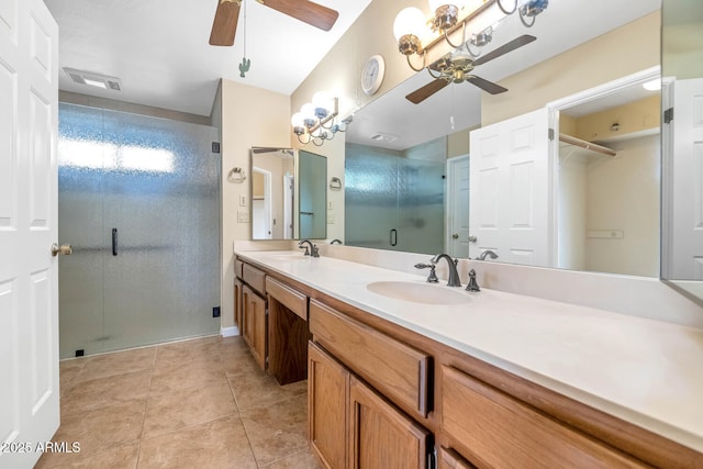 bathroom featuring a shower stall, visible vents, a sink, and tile patterned floors