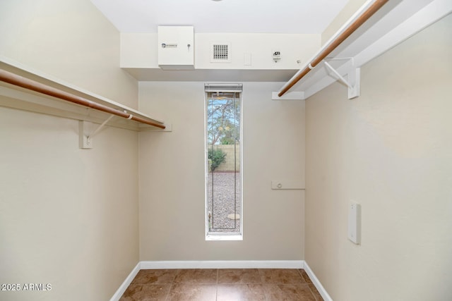 spacious closet with visible vents