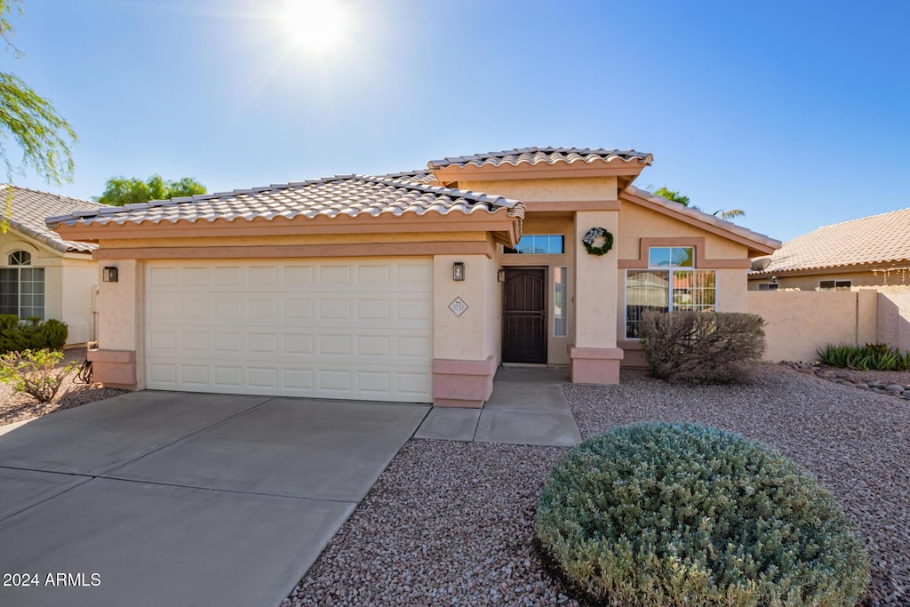 view of front of property featuring a garage