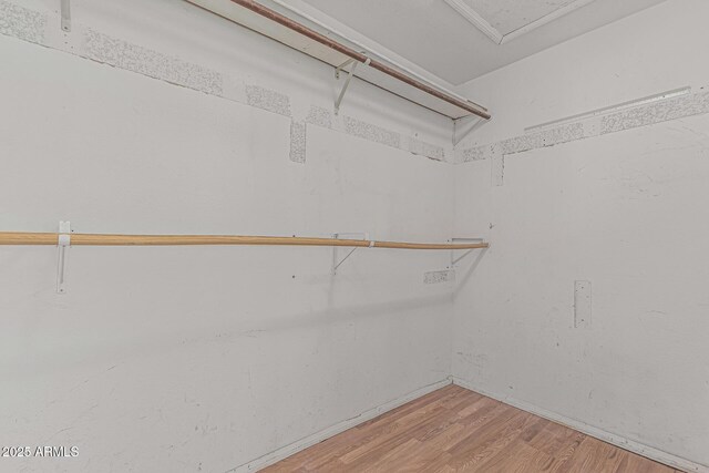 4207 W Soft Wind Dr, Glendale, AZ 85310 - spacious closet featuring wood finished floors