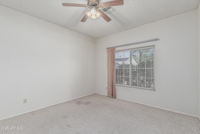 4207 W Soft Wind Dr, Glendale, AZ 85310 - spare room with a textured ceiling, carpet floors, a ceiling fan, and baseboards