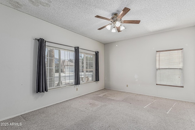 4207 W Soft Wind Dr, Glendale, AZ 85310 - carpeted empty room with a textured ceiling, a ceiling fan, and baseboards