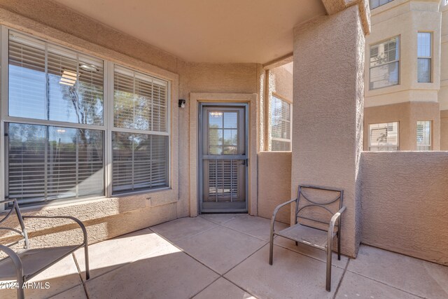 entrance to property with a patio area