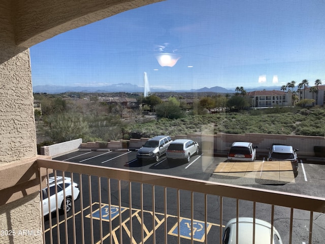 balcony featuring a mountain view