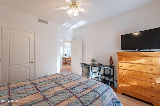 bedroom with visible vents and light wood-style floors