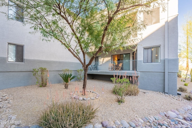 exterior space with stucco siding