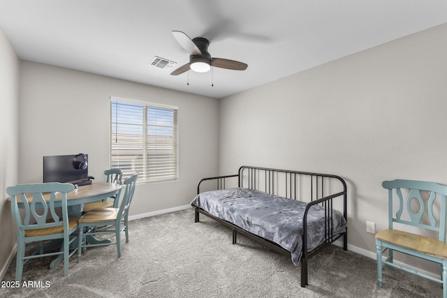 22904 E Domingo Rd, Queen Creek, AZ 85142 - carpeted bedroom with baseboards, an office area, and a ceiling fan
