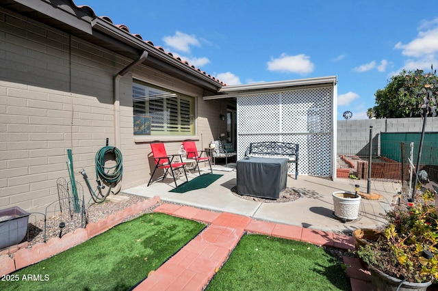 view of patio / terrace with fence