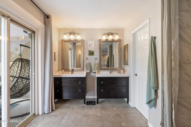 full bath featuring tile patterned floors and vanity