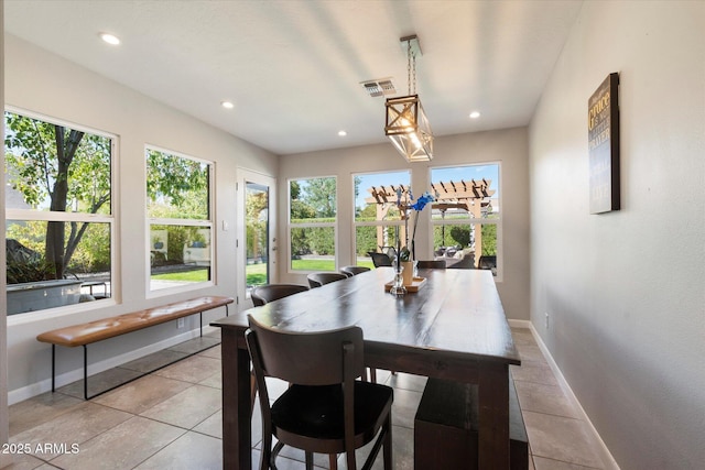 dining space with light tile patterned flooring, visible vents, recessed lighting, and baseboards