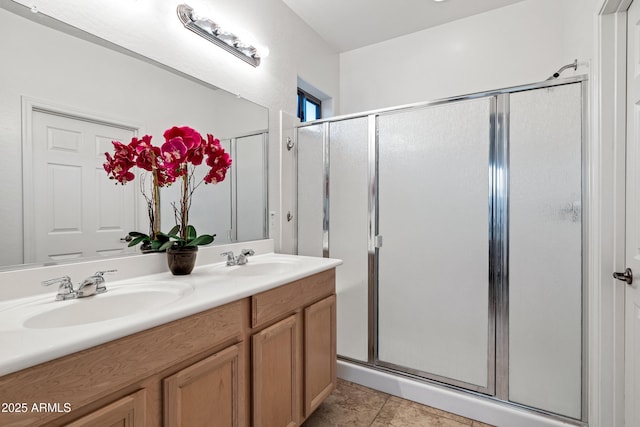 42335 W Waterfall Way, Maricopa, AZ 85138 - full bathroom featuring double vanity, a sink, and a stall shower