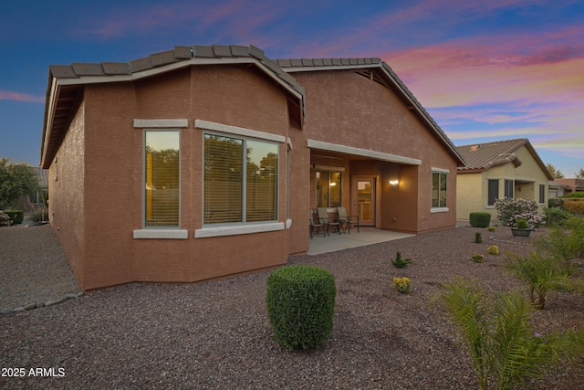 42335 W Waterfall Way, Maricopa, AZ 85138 - rear view of property with a patio area, stucco siding, and a tile roof