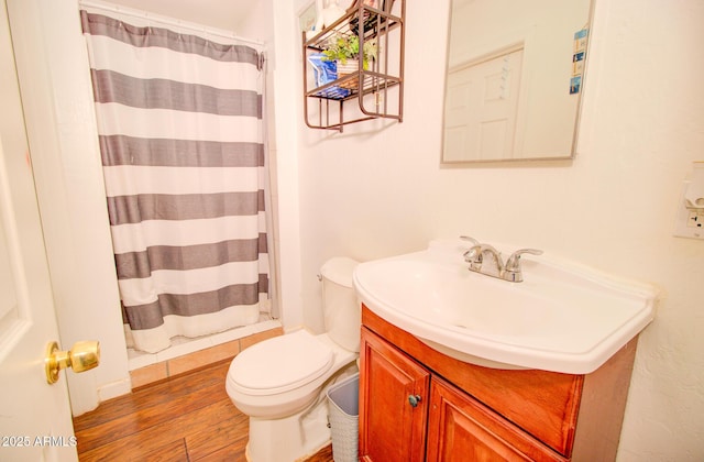 505 W 13th St, Casa Grande, AZ 85122 - bathroom featuring vanity, toilet, wood finished floors, and a shower with shower curtain