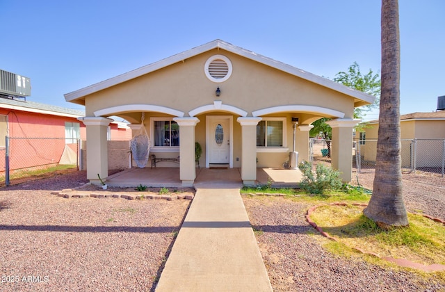 505 W 13th St, Casa Grande, AZ 85122 - mediterranean / spanish home featuring stucco siding, covered porch, and a gate
