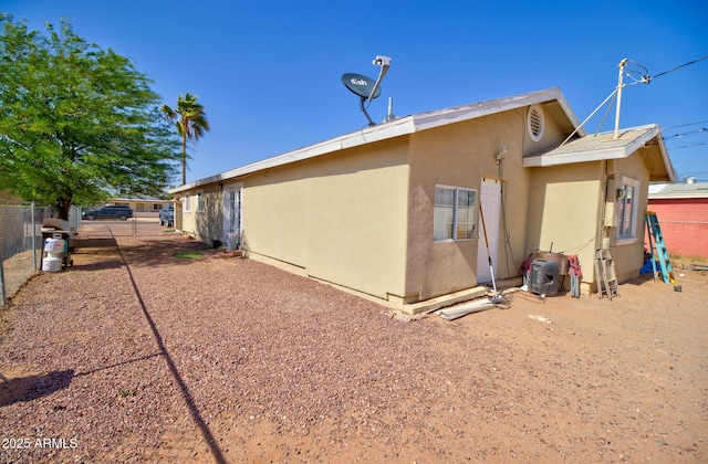 505 W 13th St, Casa Grande, AZ 85122 - back of house featuring stucco siding