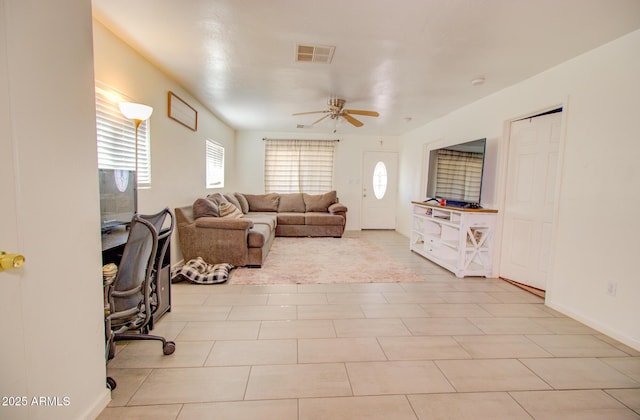 505 W 13th St, Casa Grande, AZ 85122 - living area featuring ceiling fan and baseboards
