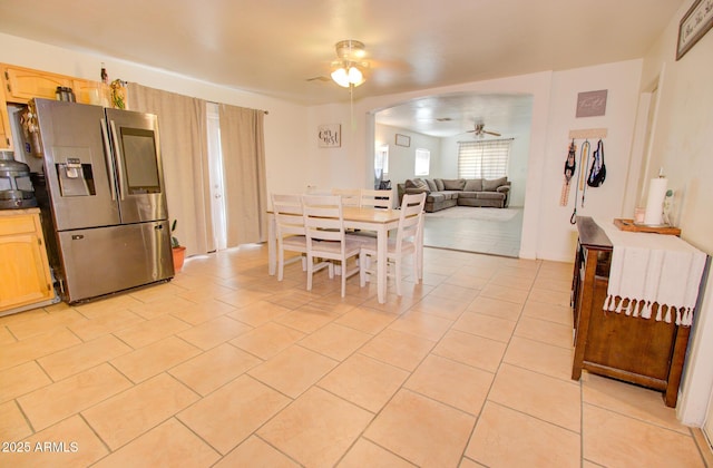 505 W 13th St, Casa Grande, AZ 85122 - dining room with a ceiling fan, light tile patterned floors, and arched walkways