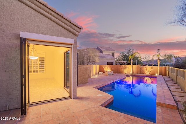 view of pool with a patio area, a fenced backyard, and a fenced in pool