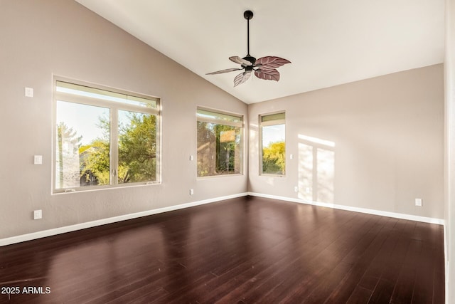 unfurnished room with lofted ceiling, ceiling fan, baseboards, and wood finished floors