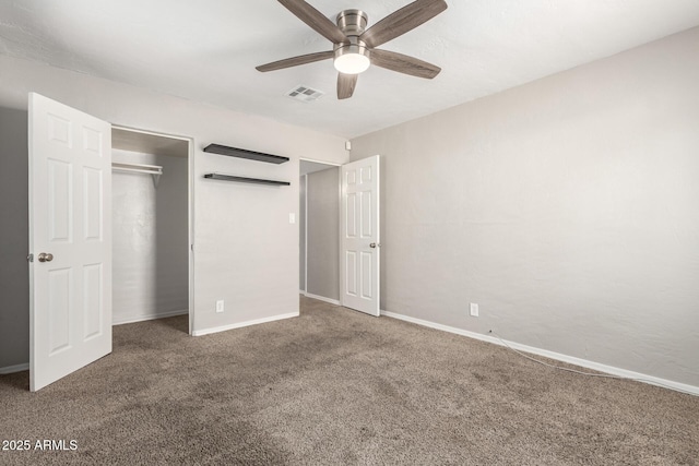 unfurnished bedroom featuring carpet flooring, a closet, ceiling fan, visible vents, and baseboards