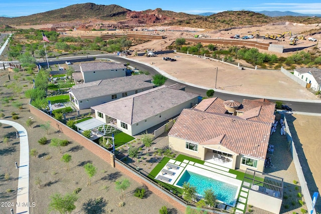 bird's eye view with a mountain view