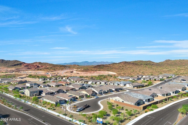 drone / aerial view featuring a mountain view