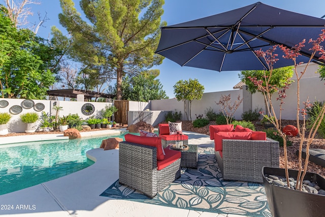 view of swimming pool featuring a patio