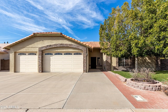 view of front of home with a garage, driveway, stone siding, and stucco siding