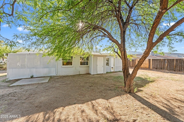 34381 S Vladimir St, Black Canyon City, AZ 85324 - rear view of property with fence and concrete block siding