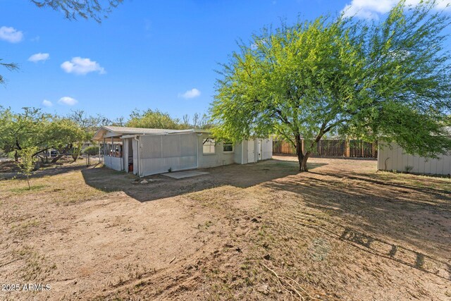 34381 S Vladimir St, Black Canyon City, AZ 85324 - exterior space featuring an outdoor structure and fence