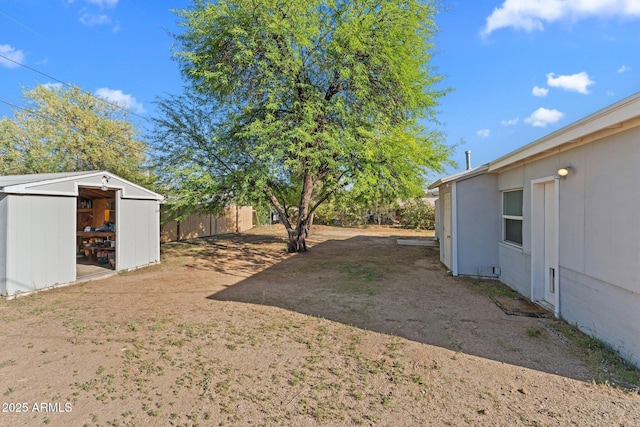 34381 S Vladimir St, Black Canyon City, AZ 85324 - view of yard with fence, an outdoor structure, and a shed